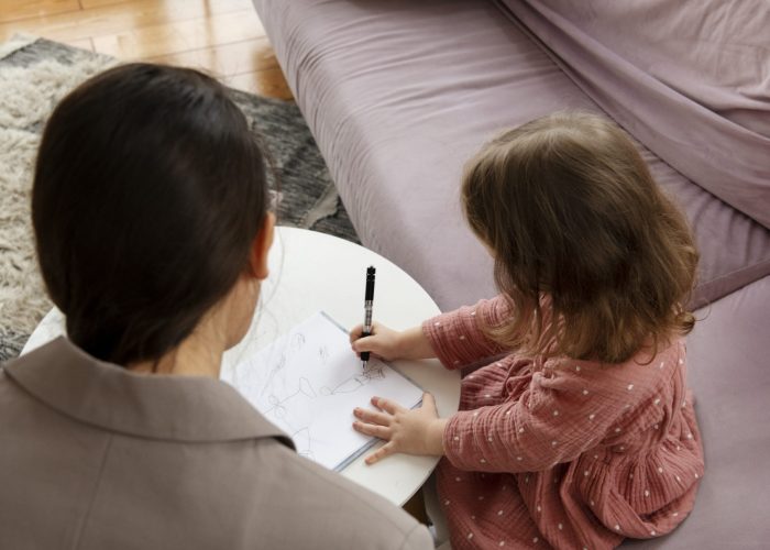 child-doing-therapy-session-with-psychologist